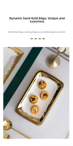 Macro shot of white ceramic tray with gold sand rim and gourmet cookies on marble table