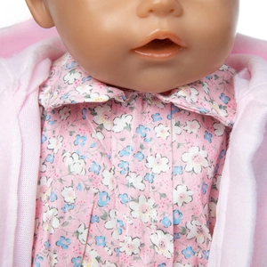 Detailed close-up of pink floral shirt and hooded jacket for 43cm baby dolls