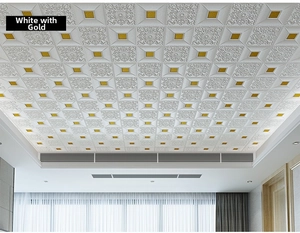 Detailed view of 3D embossed white and gold foam ceiling tiles in an indoor setting