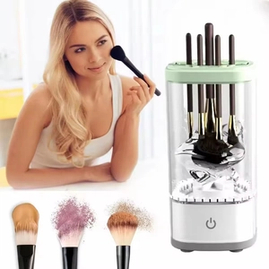 Automatic electric makeup brush cleaner with white base and clear container for deep drying