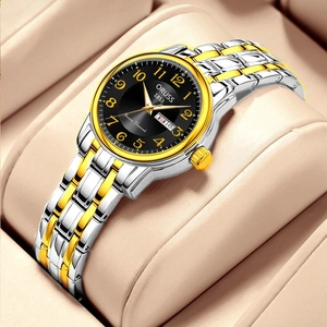 Montre à quartz pour femme classique ultra-mince étanche avec bracelet bicolore et cadran noir