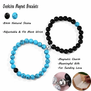 Detail of 8mm natural stone magnetic couple bracelets showing adjustable elastic band and charm