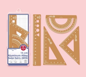 Macro shot of 4-piece bronze aluminum alloy ruler set with rulers and protractor