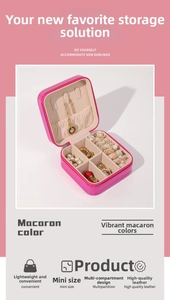 Pink holographic portable jewelry box with velvet lining and multi-compartment storage