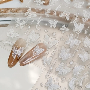 Autocollants 3D pour ongles papillon blanc avec textures fines et accents de perles