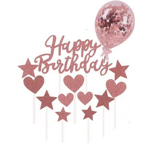 Detail of rose gold Happy Birthday cake topper set with glitter stars, hearts and balloon