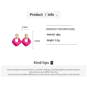 Detailed view of geometric drop earrings with dimensions of 2.5cm width and 3.5cm height