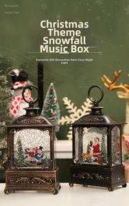 Close-up of vintage bronze Christmas music box lantern with auto-snow and LED light