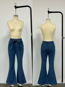 Front and back detail of high-waisted wide leg flare jeans with waist tie design