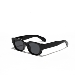 Classic black square cat-eye sunglasses with thick glossy frames and dark tinted lenses