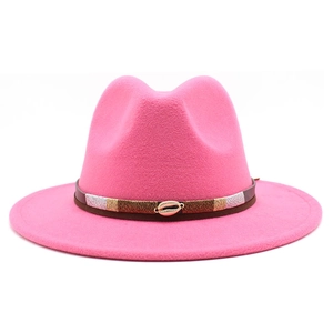 Detail of rose pink fedora hat featuring a brown leather band and seashell ornament