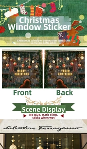Close-up of double-sided electrostatic Christmas window decals with reindeer and balls