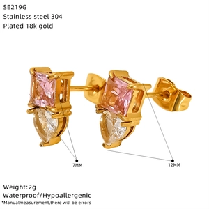 Detail of 18k gold plated stainless steel stud earrings with pink and clear zircon crystals