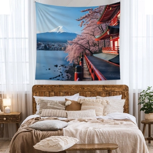 Detailed view of bohemian tapestry with Mount Fuji and cherry blossoms in a bedroom