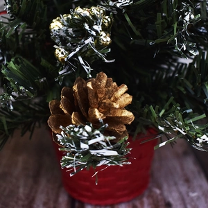 Mini Christmas tree with gold pinecones and bells in a red basket, 20-40cm festive desk decor