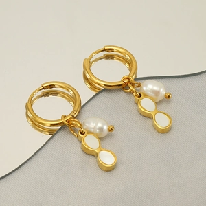 Golden hoop earrings with baroque pearls and gourd-shaped white shell pendants for women