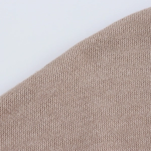 Women's beige knit set featuring a knot top and bodycon skirt with fine texture