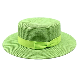 Detailed close-up of light green boater hat featuring a stylish satin ribbon bow