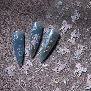 Holographic goldfish and butterfly nail stickers with laser aurora effect on blue nails