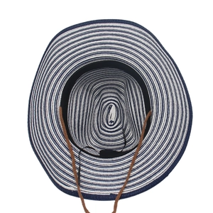 Detail of nautical striped woven sun hat featuring sweatband and adjustable wind cord