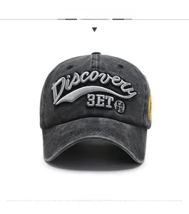 Detail of vintage washed denim baseball cap with 3D embroidery of Discovery letters