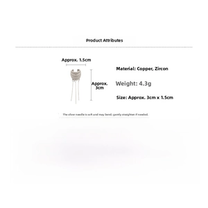 Detailed view of silver cuff earring with zircon floral accents and long tassel pendants