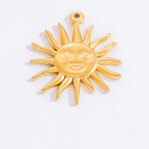 Detailed view of an 18k gold plated sun face pendant with embossed rays for DIY jewelry
