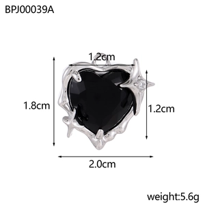 Detailed view of black heart pendant with silver border and dimensions 2.0x1.8cm