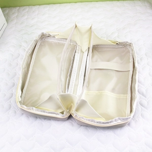 Detail view of the 180-degree flat opening and interior compartments of the pencil case