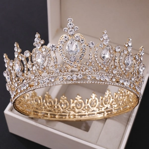 Detailed view of heart-shaped crystal bridal crown in a white gift box for weddings