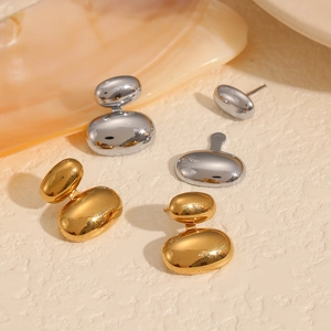 Minimalist organic bean stud earrings in 18k gold and silver stainless steel finishes