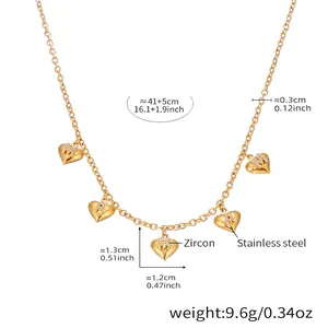 Detail view of 18K gold plated stainless steel heart necklace with cubic zirconia