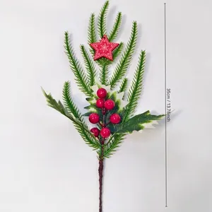 Detail of 35cm Christmas spray with pine needles, red berries, and snow star ornament