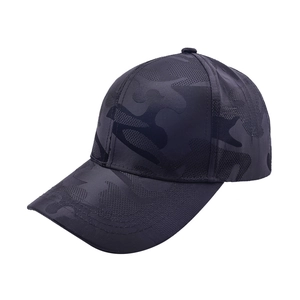 Detail view of dark camouflage baseball cap featuring breathable mesh and curved brim