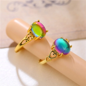 Minimalist gold adjustable rings with colorful iridescent gemstones and heart cutout design