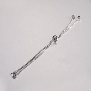 Detail of adjustable stainless steel box chain with sliding beads for DIY jewelry making