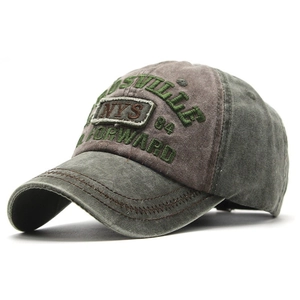Close-up of vintage washed cotton baseball cap featuring 3D embroidery and stitching