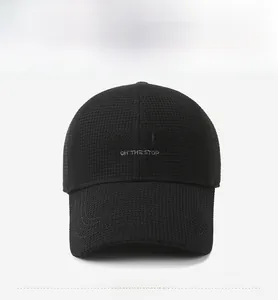Detailed view of the black plaid embroidery and Paris logo on this warm winter baseball cap