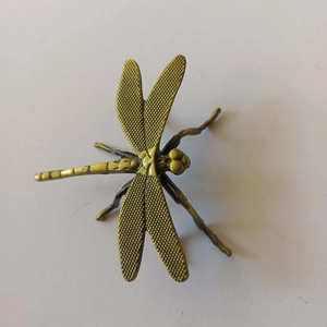 Detailed dragonfly tea pet ornament in antique brass finish for kung fu tea ceremonies