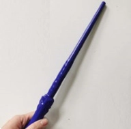 Detailed view of a light-up blue wizard magic wand with unique jointed plastic structure