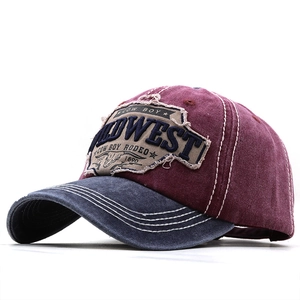 Retro distressed baseball cap in burgundy and navy with WILDWEST 1890 embroidery
