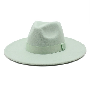 Mint green wide brim wool fedora hat with matching ribbon band on white background