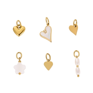 Detailed set of golden stainless steel heart charms with shell inlays and pearls