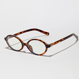 Vintage tortoiseshell oval frame glasses in retro Y2K style with clear lenses