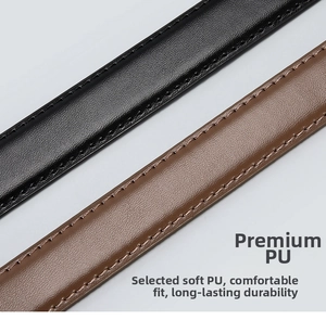 Close-up of black and brown PU leather belts showing detailed grain and reinforced stitching