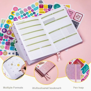 Pink undated planner set with weekly layout, colorful stickers and ribbon bookmark