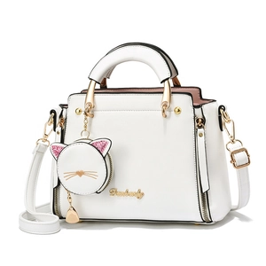 Large white PU leather tote bag for women with cat charm and gold hardware accents