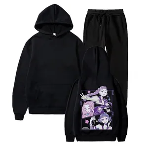 Detail of black fleece tracksuit showing the graphic print and purple brand letters on fabric