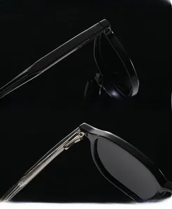 Close-up of sleek black polished frame and durable metal hinges of these sunglasses
