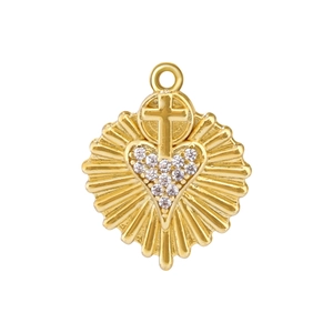 Detailed view of heart-shaped gold-plated pendant with cross pattern and clear zircon inlay
